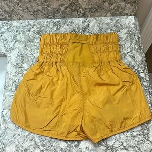 free people the way home shorts, size xs, color gold. never worn!!